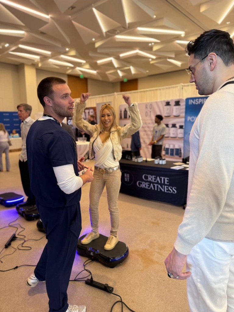 The VibraTec Platform is designed to support bone density, assist muscle recovery and ease pain. A woman is shown here on the platform.