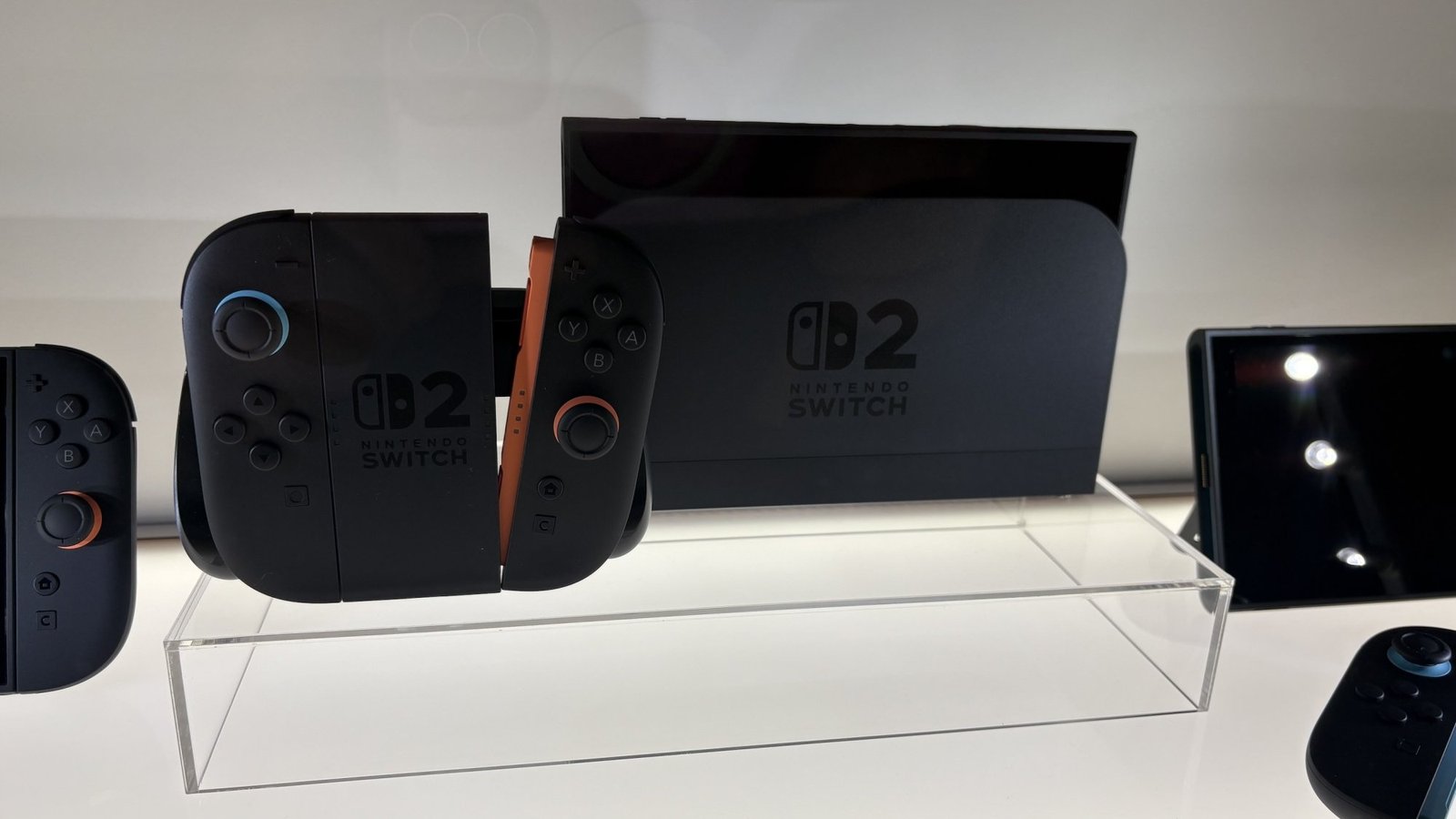 the new nintendo switch 2 on a glass display case