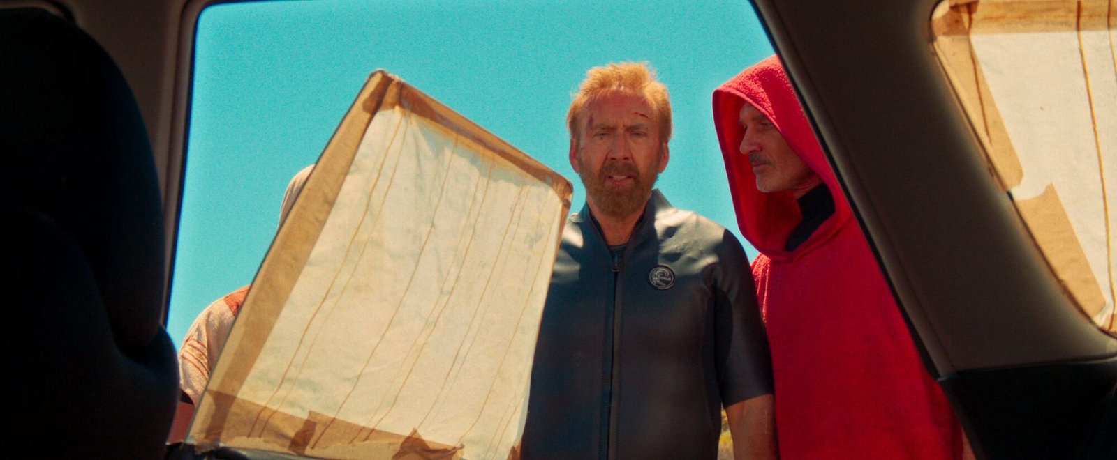 Nicolas Cage and Julian McMahon in "The Surfer."