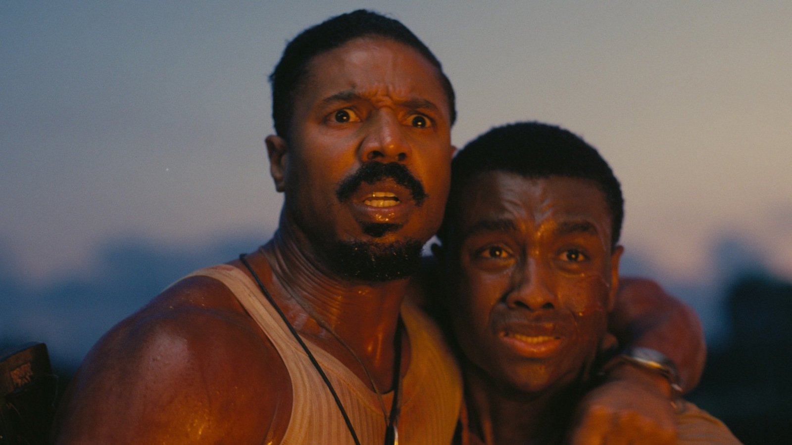 Michael B. Jordan and Miles Canton embrace in "Sinners."