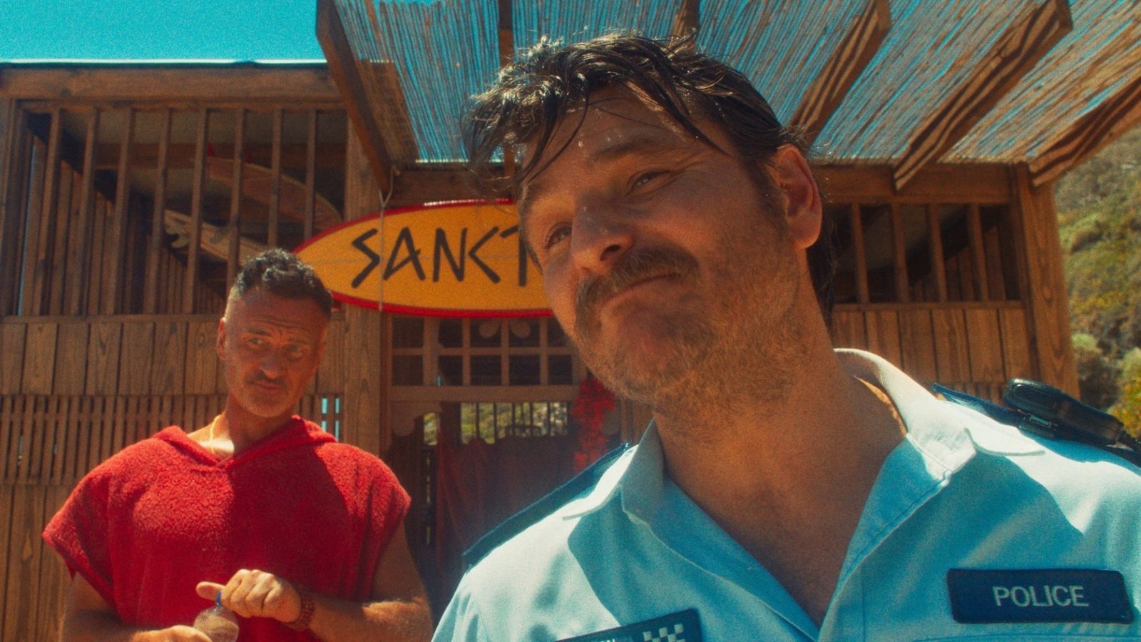 Julian McMahon and Justin Rosniak in "The Surfer."