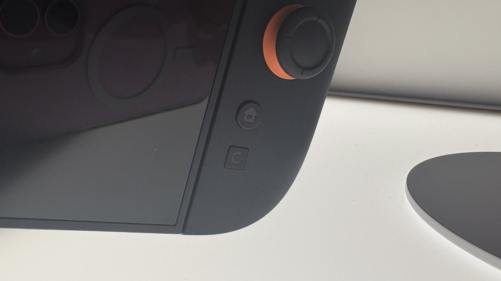 Nintendo Switch 2 C button behind glass case