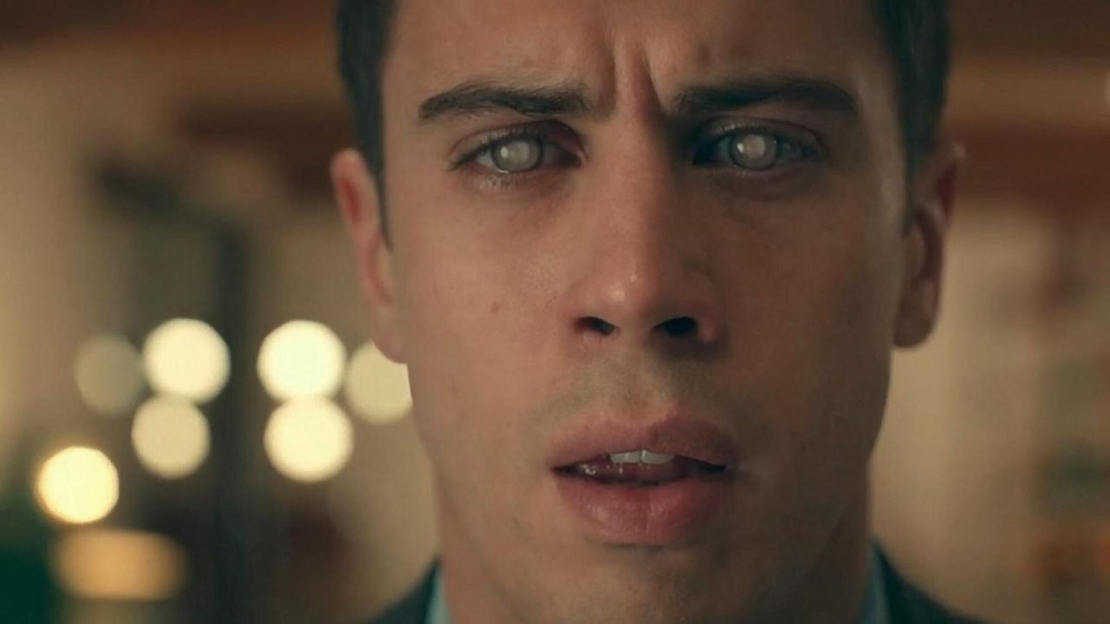 A man looks in a direction off camera.