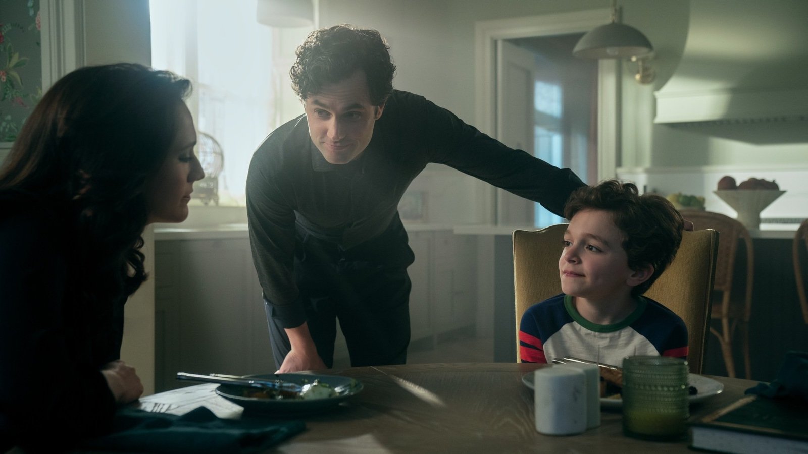 Charlotte Ritchie as Kate Lockwood, Penn Badgley as Joe Goldberg, and Frankie Demaio as Henry Goldberg in episode 503 of "You."